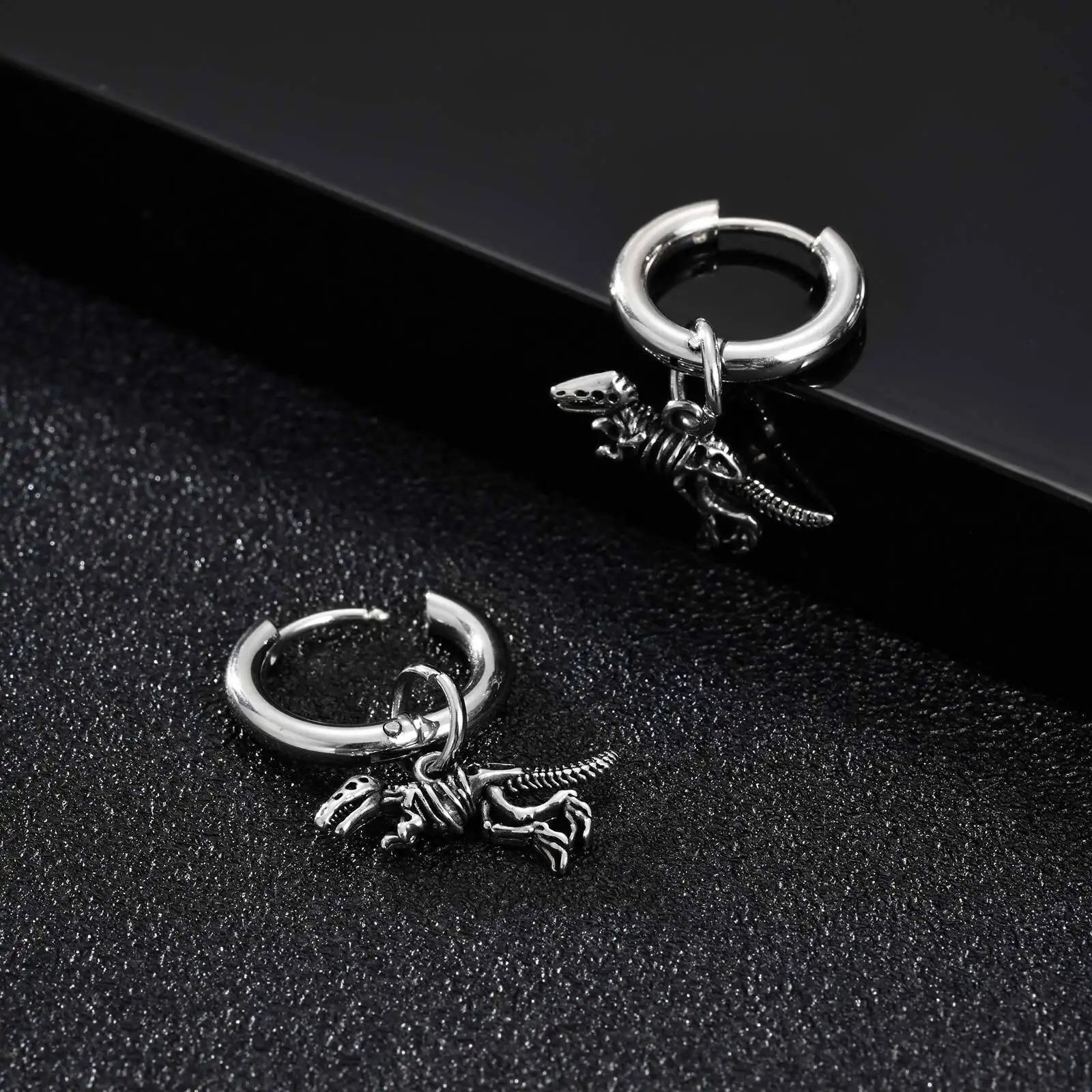 Raptor Fossil Drop Earrings – 316L Stainless Steel Gothic Jewelry by Chrome Cult