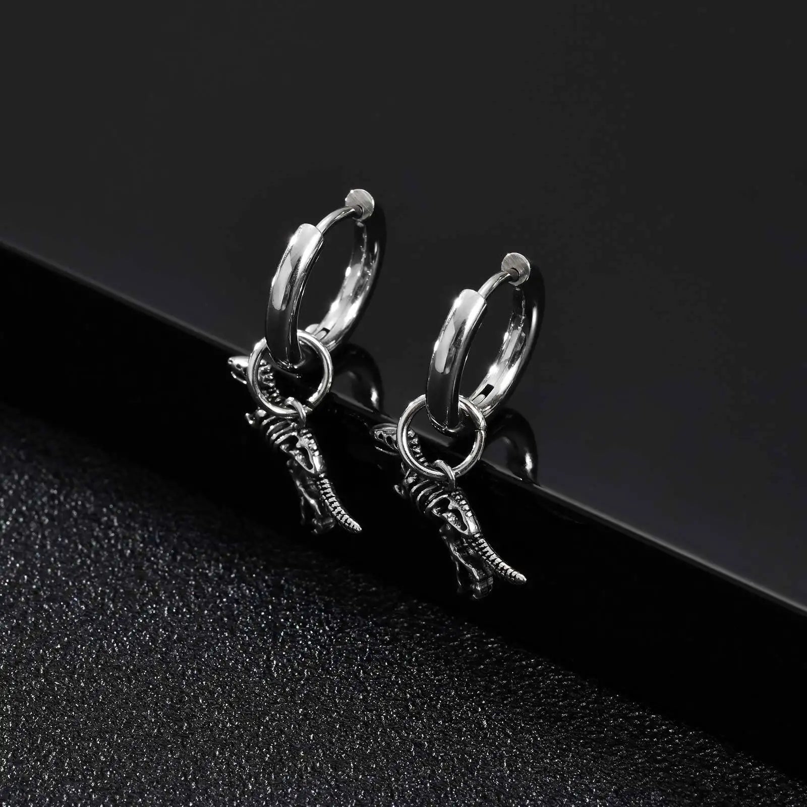 Raptor Fossil Drop Earrings – 316L Stainless Steel Gothic Jewelry by Chrome Cult